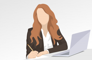 Image of a female with a computer and pen - solicitor